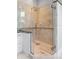 Bathroom featuring granite countertops, tile flooring, and a glass shower enclosure at 1415 Brumley Rd, Chuluota, FL 32766