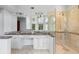 Spacious bathroom with dual sinks, granite countertops, and a glass shower enclosure at 1415 Brumley Rd, Chuluota, FL 32766