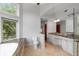 Large bathroom featuring granite countertops, dual sinks, tile flooring, and a garden tub at 1415 Brumley Rd, Chuluota, FL 32766