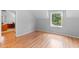 Bedroom with hardwood floors and backyard view at 1415 Brumley Rd, Chuluota, FL 32766