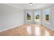 Bright bedroom with gleaming hardwood floors and pastoral view at 1415 Brumley Rd, Chuluota, FL 32766
