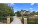 Stunning two-story home with a beautiful turret and well-manicured front yard at 1415 Brumley Rd, Chuluota, FL 32766