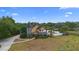 A stunning two-story home featuring a turret and a backyard with a pool at 1415 Brumley Rd, Chuluota, FL 32766