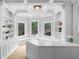 Bright home office featuring custom built-ins and three bright windows at 1415 Brumley Rd, Chuluota, FL 32766