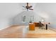 Office space with natural light, hardwood floors, and a ceiling fan at 1415 Brumley Rd, Chuluota, FL 32766