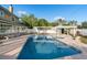 Sparkling pool and spa area with well-manicured landscaping for outdoor enjoyment at 1415 Brumley Rd, Chuluota, FL 32766