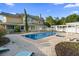 A beautiful backyard pool and outdoor living space perfect for relaxing and entertaining in style at 1415 Brumley Rd, Chuluota, FL 32766