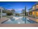 Inviting in-ground pool with a surrounding deck perfect for outdoor entertaining and relaxation at 1415 Brumley Rd, Chuluota, FL 32766