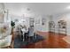 Bright dining area featuring hardwood floors, stylish decorations, and an open layout at 15210 Montesino Dr, Orlando, FL 32828