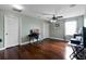 Hardwood flooring in a well lit area with neutral paint and multiple windows at 15210 Montesino Dr, Orlando, FL 32828
