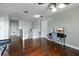 Bright living space with hardwood flooring, neutral paint and a staircase view at 15210 Montesino Dr, Orlando, FL 32828
