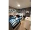 The bedroom features a unique Star Wars theme with a bunk bed and themed decorations at 197 Jetty Way, Davenport, FL 33897