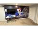 bedroom showcasing space-themed wallpaper and gaming area, offering a unique and playful environment at 197 Jetty Way, Davenport, FL 33897
