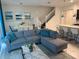 The living area has an open floor plan and features a dining area and kitchen at 197 Jetty Way, Davenport, FL 33897