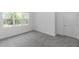 Bedroom shows large window for natural light and neutral carpet at 2065 East Pkwy, Deland, FL 32724