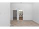 Bright bedroom with neutral carpet adjoins bathroom and closet at 2065 East Pkwy, Deland, FL 32724