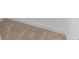 Carpeted staircase featuring a cream color, white trim, and a white wall at 2065 East Pkwy, Deland, FL 32724