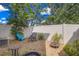 Backyard featuring a combination of patio furniture and partially dead grass at 2288 Leland Ln, Casselberry, FL 32707