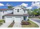 Charming two-story townhome with attached garage and well-maintained landscaping at 2288 Leland Ln, Casselberry, FL 32707