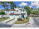 Charming two-story townhome with a two-car garage and a landscaped yard at 2288 Leland Ln, Casselberry, FL 32707