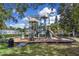 Community playground for children with slides and climbing structures at 2288 Leland Ln, Casselberry, FL 32707