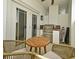 Outdoor balcony features a stainless steel grill built into a counter and a small round table at 2305 Edgewater Dr # 1604, Orlando, FL 32804