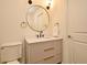 Elegant powder room with a stylish vanity, modern fixtures, and a clean, inviting design at 2305 Edgewater Dr # 1604, Orlando, FL 32804