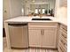Bright kitchen showcasing stainless steel appliances, a undermount sink, and soft-close cabinetry at 2305 Edgewater Dr # 1604, Orlando, FL 32804