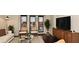 Comfortable living room with natural light, modern furniture, and a view of the balcony at 2305 Edgewater Dr # 1604, Orlando, FL 32804