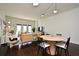 Open-concept living space with modern furnishings, hardwood floors, and balcony with abundant natural light at 2305 Edgewater Dr # 1604, Orlando, FL 32804