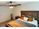 Cozy bedroom featuring a comfortable bed with decorative pillows and modern furniture at 239 Se 66Th Ct, Ocala, FL 34472