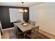 Dining area featuring a modern chandelier, decor, and a dining table at 239 Se 66Th Ct, Ocala, FL 34472