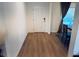 Bright entryway with hardwood flooring, white trim, and natural light from window at 239 Se 66Th Ct, Ocala, FL 34472