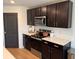 Modern kitchen showcasing stainless steel appliances and white countertops at 239 Se 66Th Ct, Ocala, FL 34472