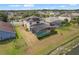 Aerial view of homes with screened-in pools and lush landscaping at 2803 Boating Blvd, Kissimmee, FL 34746