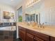 Bright bathroom with double vanity, garden tub, and sleek countertops at 2803 Boating Blvd, Kissimmee, FL 34746