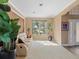 Bright living room featuring a plush sofa, large windows, and stylish decor, creating a welcoming atmosphere at 2803 Boating Blvd, Kissimmee, FL 34746