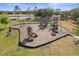 Community playground featuring slides, climbing structures, and soft landing surfaces at 2803 Boating Blvd, Kissimmee, FL 34746
