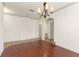 Elegant dining room featuring hardwood floors and arched doorways, offering a seamless flow at 3752 Cleary Way, Orlando, FL 32828