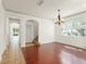Elegant dining room with hardwood floors and a chandelier, perfect for gatherings and entertaining at 3752 Cleary Way, Orlando, FL 32828