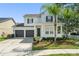 Charming two-story home featuring a well-manicured front yard and a spacious two-car garage at 3752 Cleary Way, Orlando, FL 32828