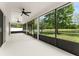 Spacious screened patio with ceiling fans and views of the landscaped backyard at 3752 Cleary Way, Orlando, FL 32828