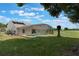 A large, well-maintained backyard features a screened-in pool and ample room for recreation at 3780 Ventura Cove Dr, Orlando, FL 32822