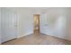 Bedroom with wood floors showing entry to closet and attached bath at 3780 Ventura Cove Dr, Orlando, FL 32822