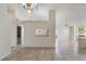 An open-concept dining area adjacent to the kitchen, perfect for modern living at 3780 Ventura Cove Dr, Orlando, FL 32822