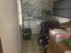 Utility room containing washer, dryer, and various storage items at 404 E Kentucky Ave, Deland, FL 32724