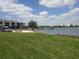 Beautiful view of the lakefront beach area and boat dock from the lawn at 4109 Fairview Vista Pt # 315, Orlando, FL 32804