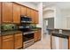 Updated kitchen featuring stainless steel appliances and granite countertops at 453 Kays Landing Dr, Sanford, FL 32771