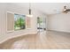Spacious living room featuring tile floors, a large window and sliding glass door at 453 Kays Landing Dr, Sanford, FL 32771