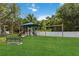 Well-maintained community playground featuring slides, swings, and a covered play area for hours of outdoor fun at 453 Kays Landing Dr, Sanford, FL 32771